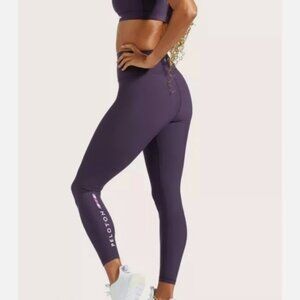Peloton Cadent leggings in plum- size medium